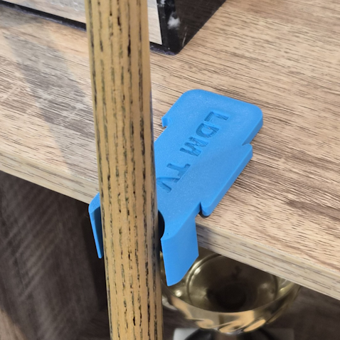 Blue LDM TV 3D printed cue rest being used on a pool table